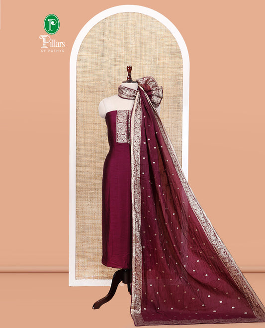 Wine Material Churidar Set Features Gold Zari Neck Work Top, a Plain Santoon Bottom, a Banarasi Dupatta