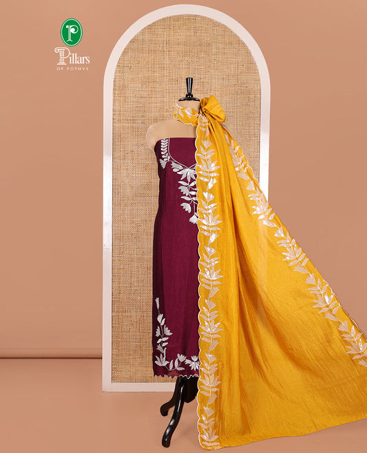 Wine Material Churidar Set, Detailed with Floral Motifs Sequins-Thread Embroidered on Its Vichitra Silk Top, Comes with a Contrast Santoon Bottom, and Paired with a Vichitra Silk Floral Embroidered Scallop Dupatta