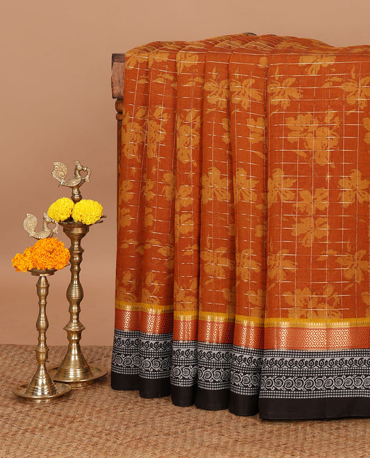 Mustard color checked & floral printed chanderi cotton saree, contrast zari & block printed border of diamond, bentex, floral creeper & paisley design along with zari striped pallu