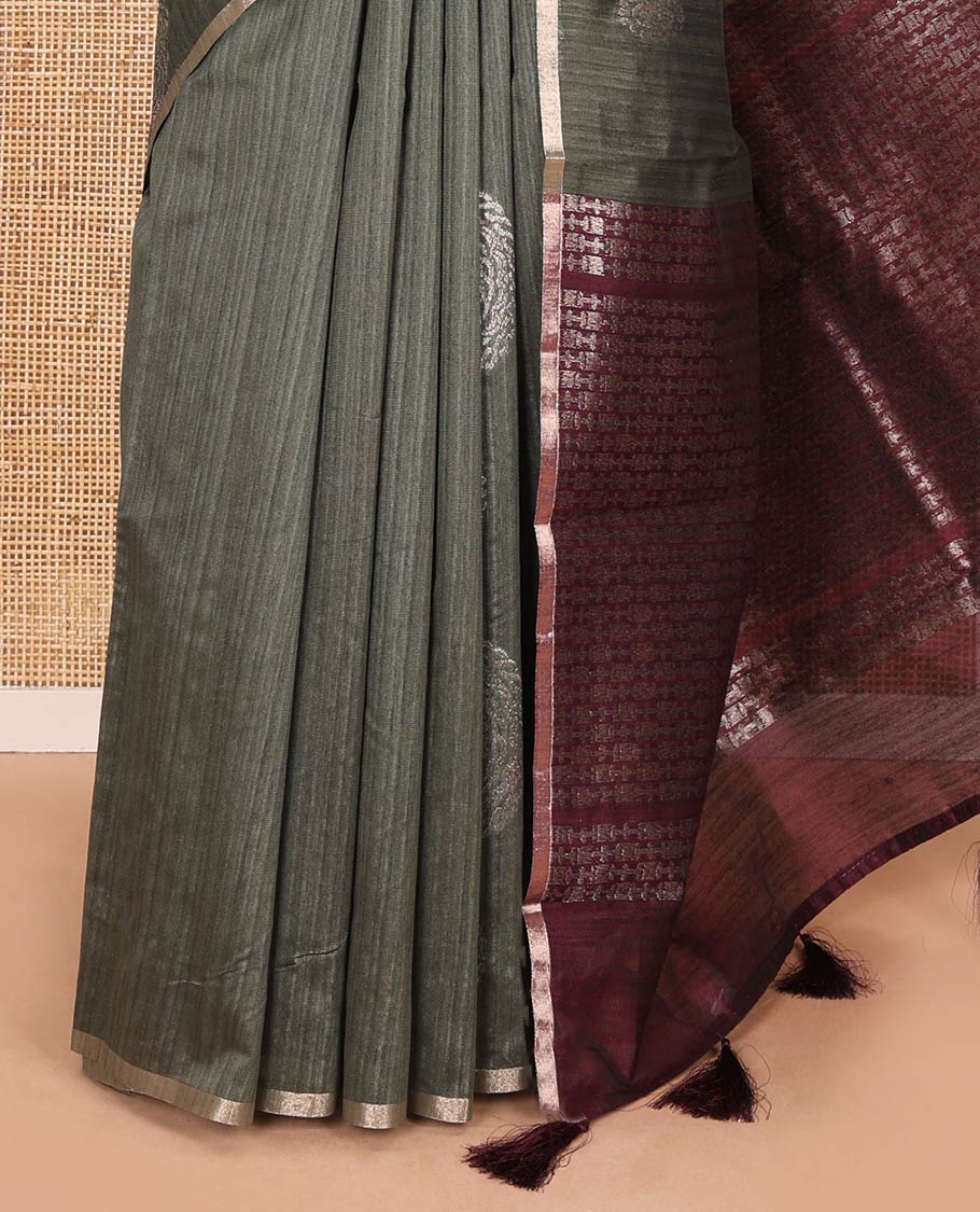 Borderless green neem zari circle motifs fancy tussar saree with contrast diamond-patterned zari-rich pallu, and a contrast striped blouse