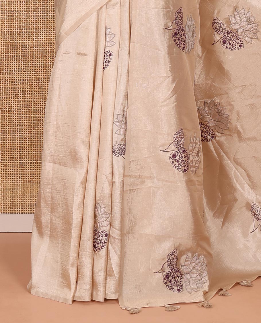 Borderless chikku floral motifs embroidered fancy tussar saree, floral motifs embroidered pallu, and a plain blouse