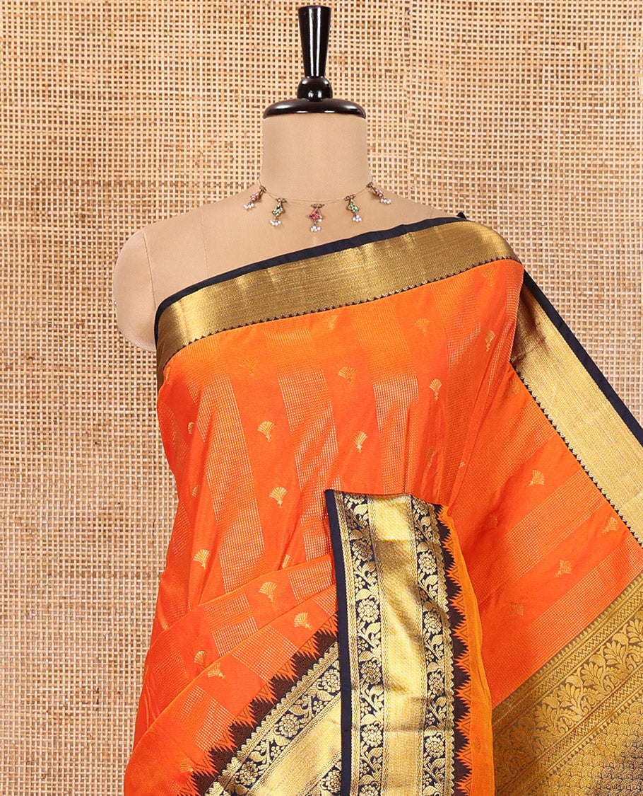 Orange Kanchipuram Budget Silk Saree, Finely Detailed with Zari Designs All Over Its Body, Complemented by a Contrast Temple Border of Floral Creeper Designs, Majestically Detailed Pallu, and Paired with a Contrast Blouse