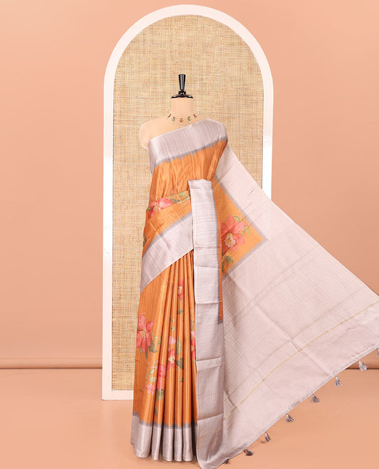 Mustard Fancy Tussar Silk Saree, Elevated with Floral Cross Stitch Embroidery All Over Its Body, Complemented by a Contrast Temple Zari Checked Border, Pallu of Checked Designs, and Paired with a Contrast Blouse