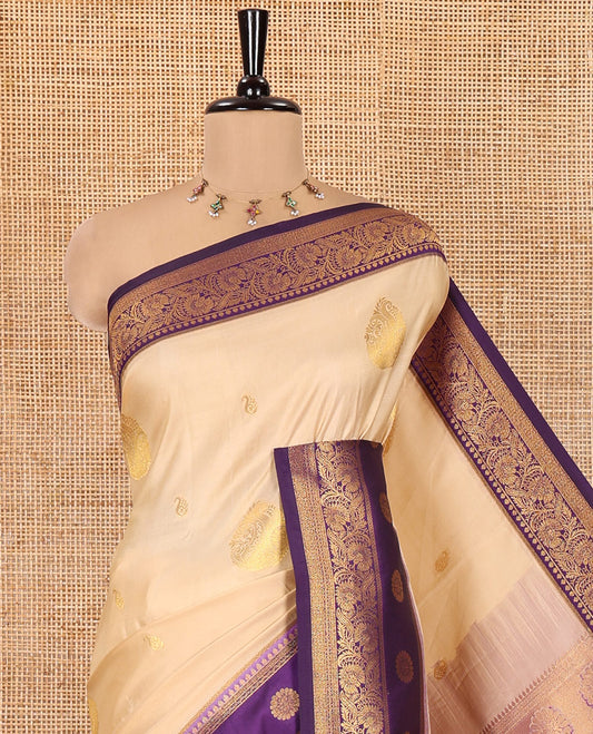 Beige Art Silk Saree, Entralled with Zari Buttas, a Contrast Traditional Zari Border, Grand Pallu and a Contrast Blouse