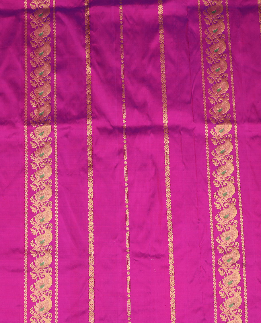 Rani Pink Pure Silk Half-Saree Embellished with Zari Designs on the Skirt, Complemented by a Contrast Zari-Design Border, Paired with a Contrast Blouse, and Featuring a Jaal-Designed Dhavani