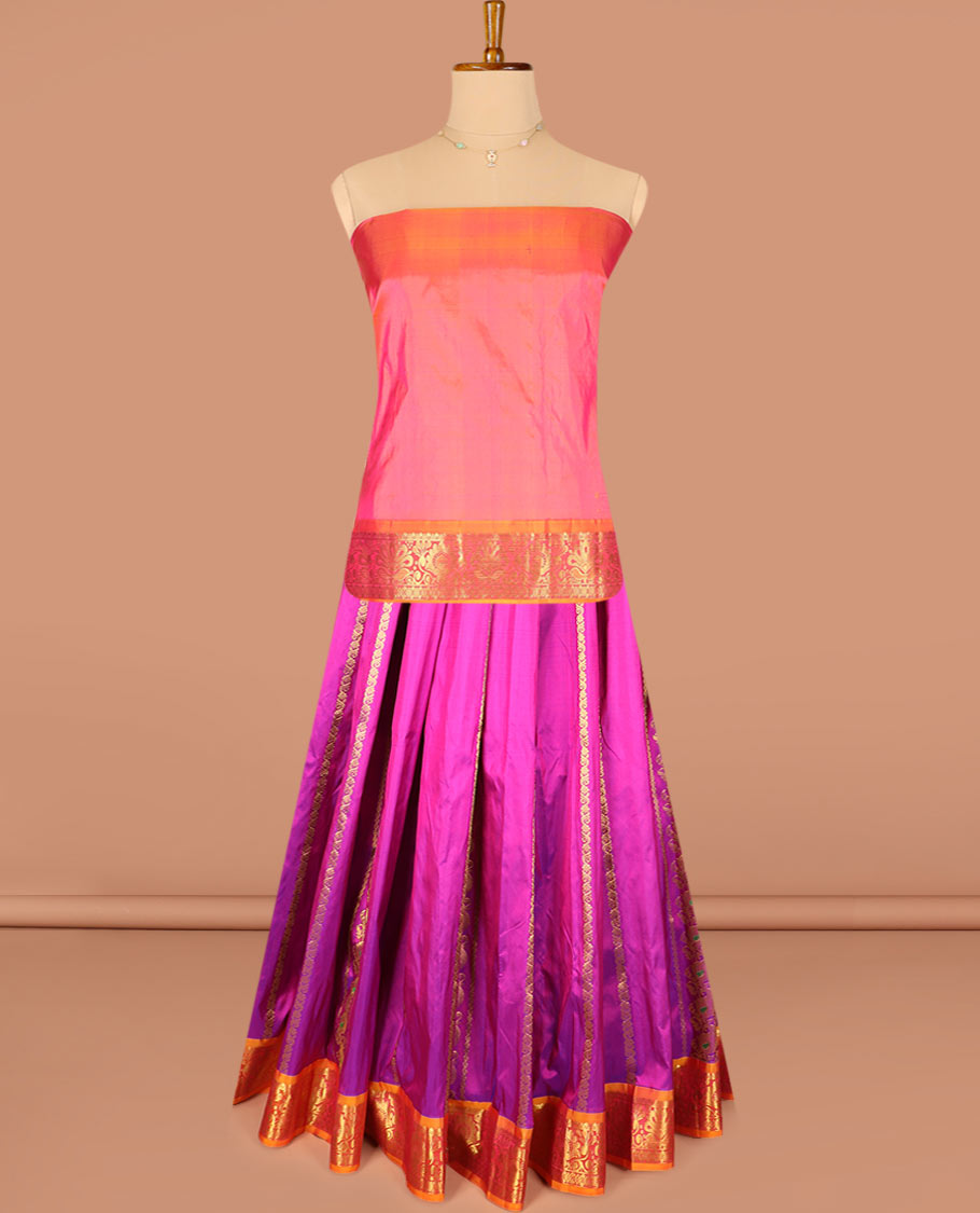 Rani Pink Pure Silk Half-Saree Embellished with Zari Designs on the Skirt, Complemented by a Contrast Zari-Design Border, Paired with a Contrast Blouse, and Featuring a Jaal-Designed Dhavani