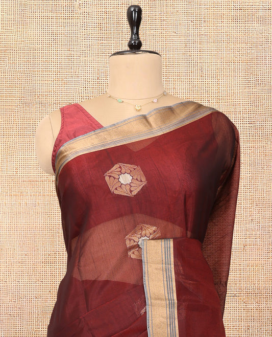 Maroon Cotton Saree, Detailed with Hexagon Zari Buttas, a Contrast Zari Butta Border, an Intricate Pallu and a Contrast Blouse