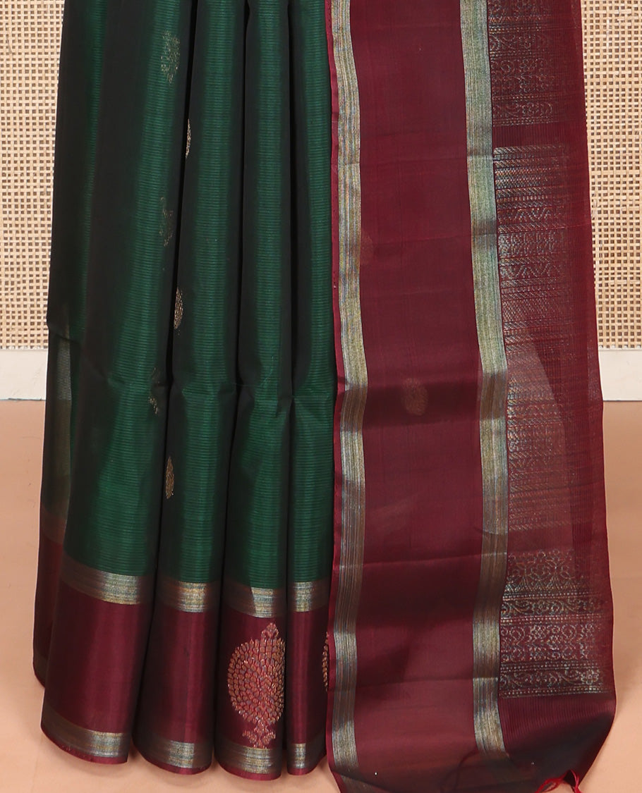 Green Silk Cotton Saree, Artfully Woven with Peacock and Rudraksham Motifs On Its Body, Complemented by Contrast Zari Motifs Woven Border, Geometric Zari Patterned Pallu and Paired with a Contrast Blouse