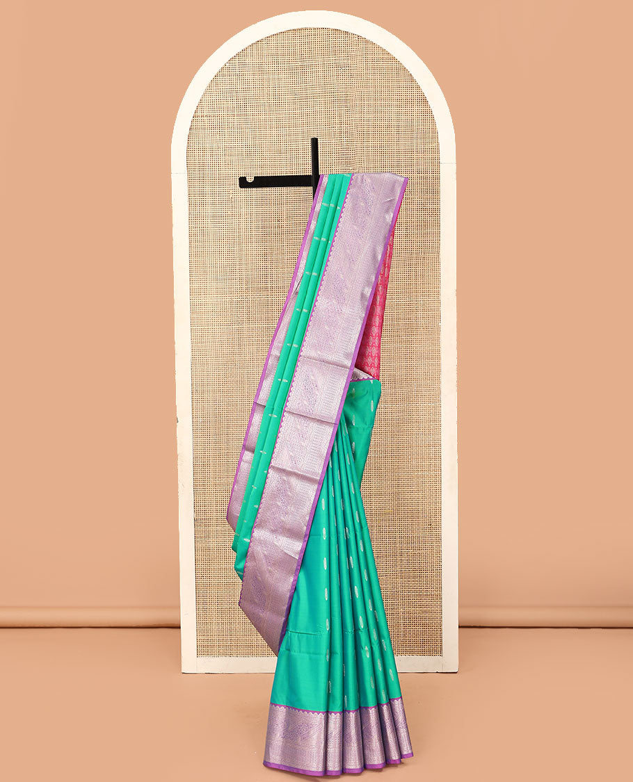 Green zari buttas soft silk saree, contrast traditional zari design woven border, and pallu of zari weave