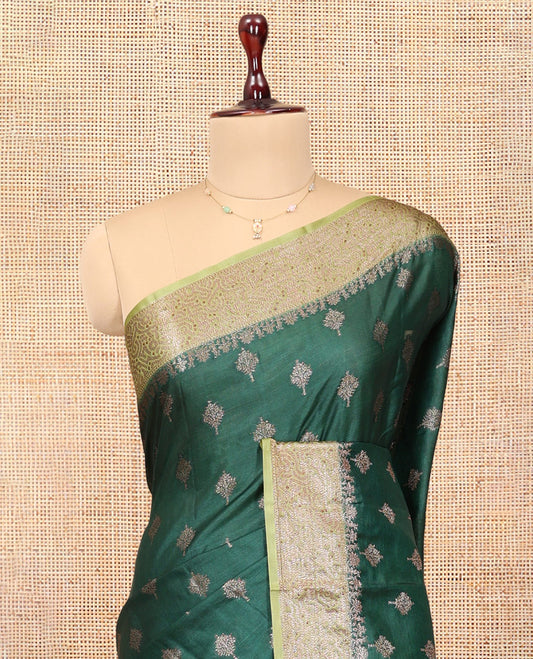 Green Tussar Silk Saree, Elevated with Zari Buttas, a Contrast Zari Border, Grand Pallu, and a Contrast Blouse