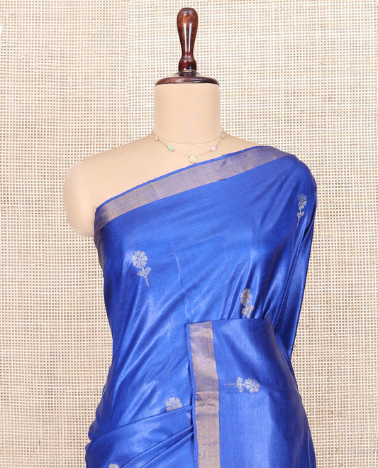 Royal Blue Tussar Silk Saree, Decorated with Floral Buttas All Over Its Body, Subtly Piping Border, Pallu Steeped with Intricate Designs, and Paired with a Matching Blouse