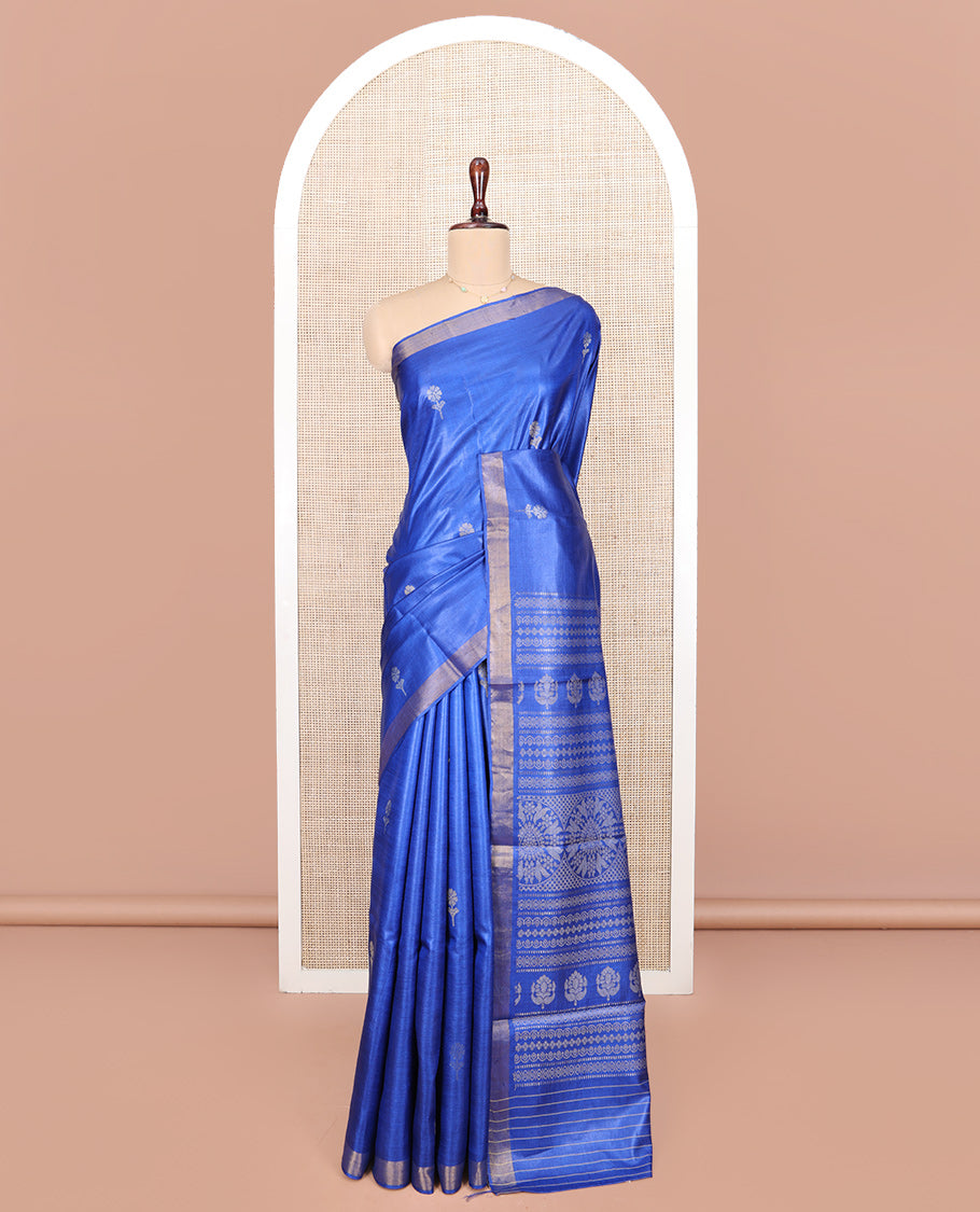 Royal Blue Tussar Silk Saree, Decorated with Floral Buttas All Over Its Body, Subtly Piping Border, Pallu Steeped with Intricate Designs, and Paired with a Matching Blouse