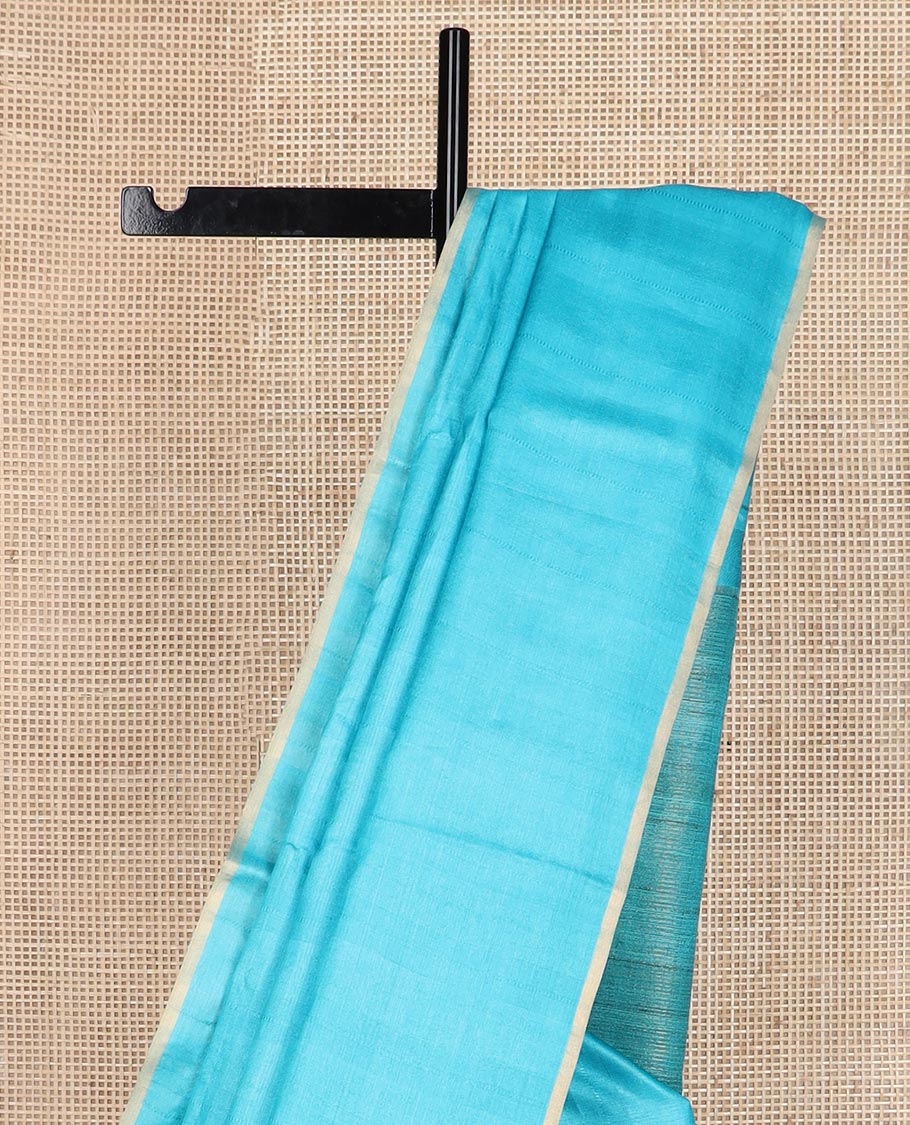 Borderless sky blue sparsely striped tussar silk saree, striped pallu