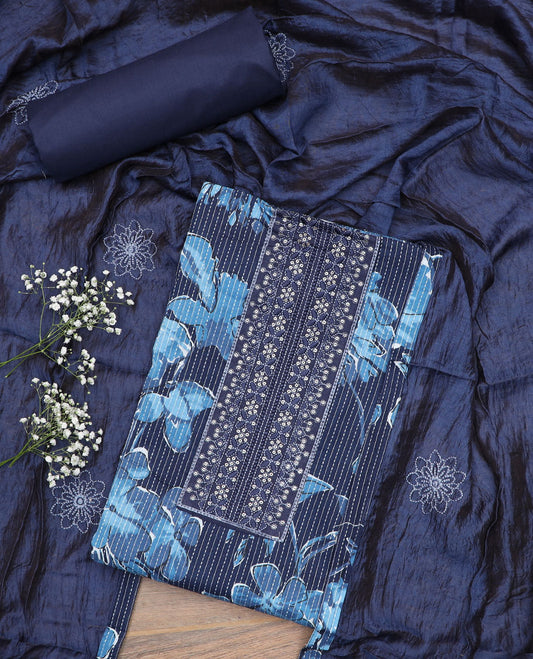 Blue material churidar set, floral print and neck embroidered top, plain bottom, and a floral embroidered dupatta