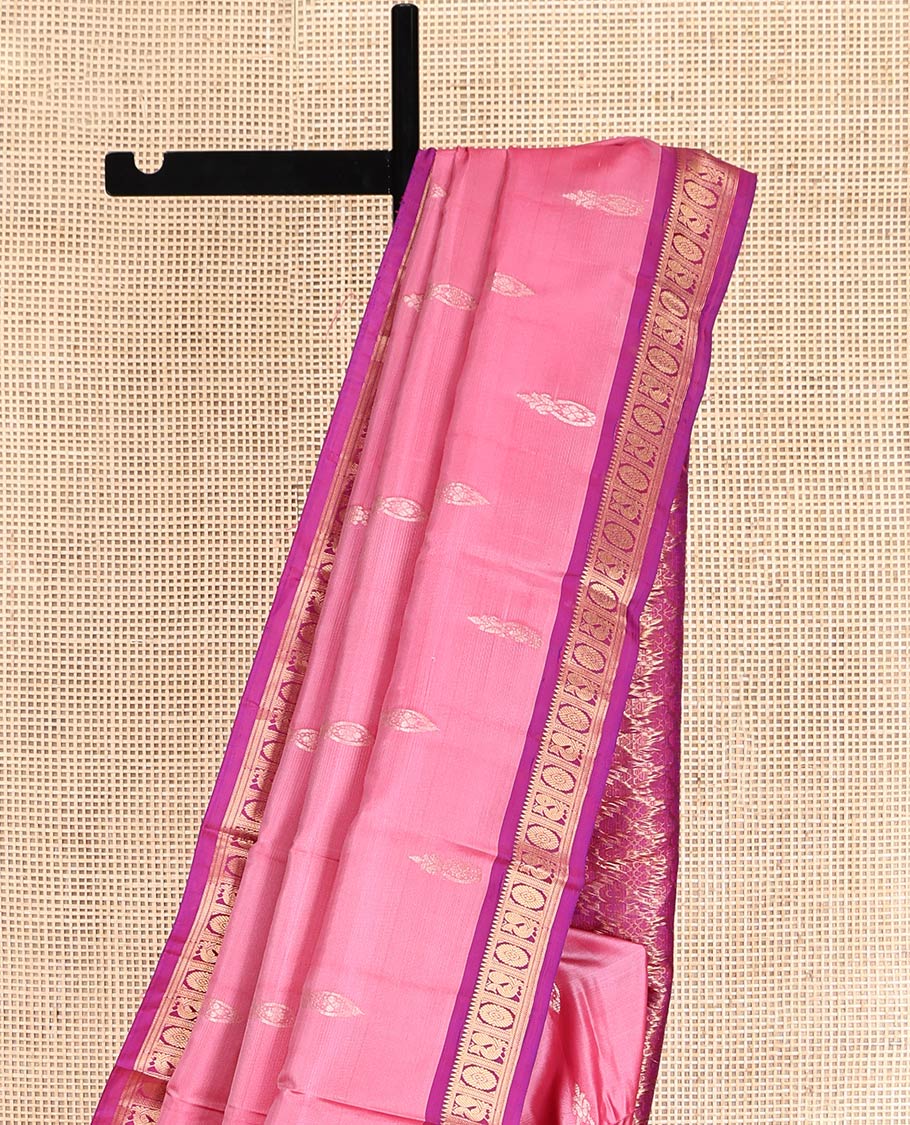 Pink Uppada Silk Saree, Ornamented with Zari Buttas, a Contrast Peacock-Chakram Border, Grand Pallu, and a Contrast Blouse