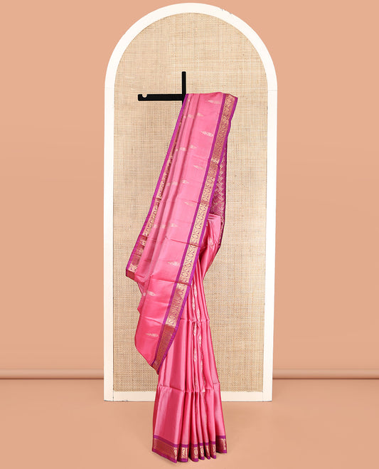 Pink Uppada Silk Saree, Ornamented with Zari Buttas, a Contrast Peacock-Chakram Border, Grand Pallu, and a Contrast Blouse
