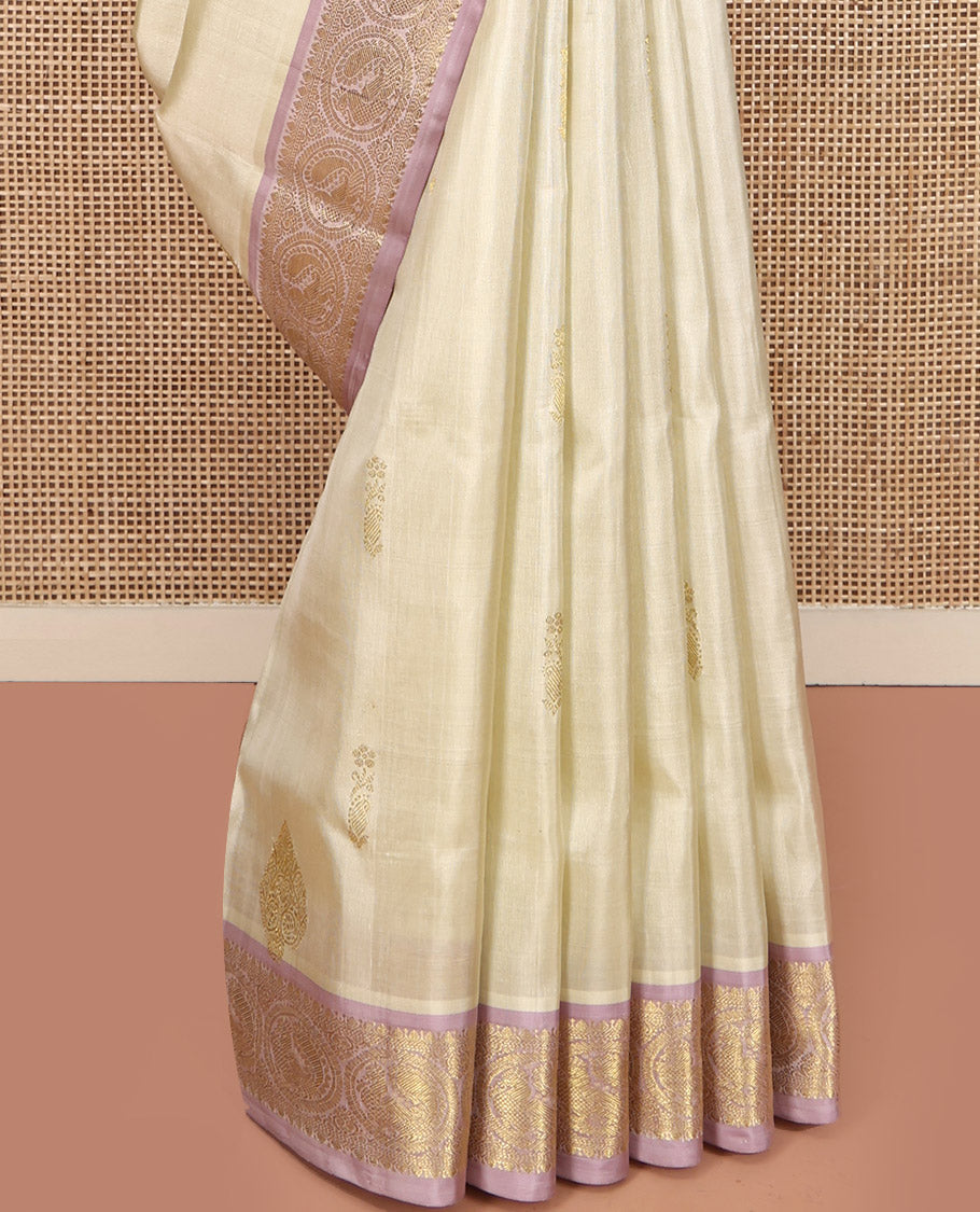 Off-White Venkatagiri Silk Saree, Spotlighted with Zari Buttas All Over Its Body, Complemented by a Contrast Traditional Zari Design Border, Grand Pallu, and Paired with a Contrast Blouse