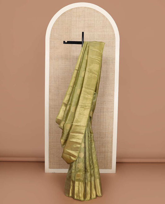 Green zari buttas and checked Vasundhara silk mix saree, zari border of mayil designs, and  zari-rich jaal pallu