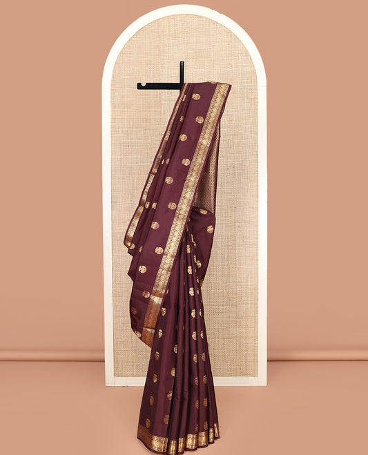 Brown Vasundhara Lite Silk Mix Saree, Elegantly Designed with Iruthalai Pakshi Buttas on Its Body, Highlighted by Zari Border of Muthu, Kamalam, and Manga Designs, Pallu Featuring Floral Designs, and Paired with a Matching Blouse