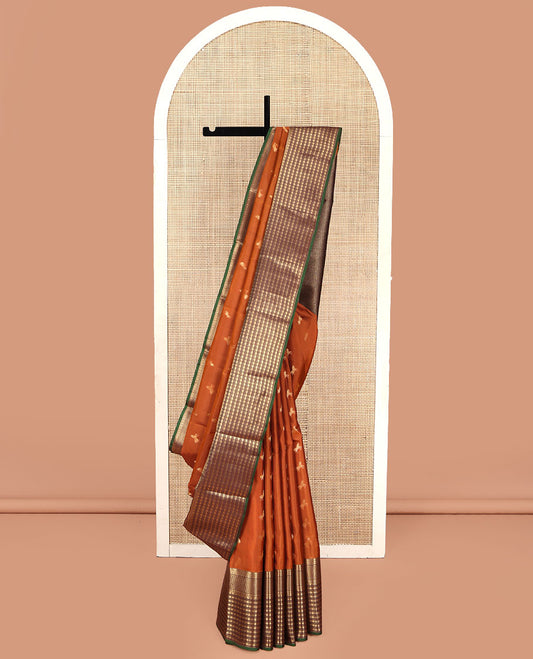 Orange Vasundhara Lite Silk Mix Saree, Graced with Zari Buttas on Its Body, Complemented by a Contrast Border of Rekku, Kathir, Rudraksham, Ara Maadam, and Mayil Kann Designs, Geometric Textured Pallu, and Paired with a Contrast Blouse