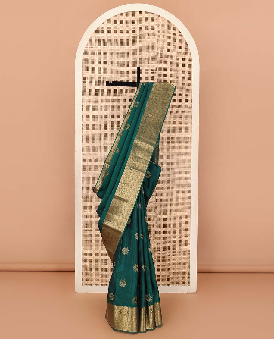 Green floral zari buttas Vasundhara silk mix saree, zari border of thilakam, manga, kodi visiry, and jaal designs, and intricate pallu