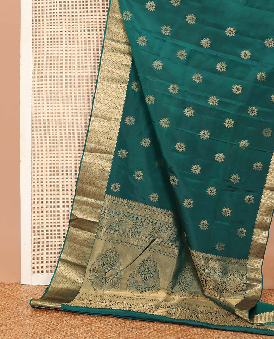 Green floral zari buttas Vasundhara silk mix saree, zari border of thilakam, manga, kodi visiry, and jaal designs, and intricate pallu