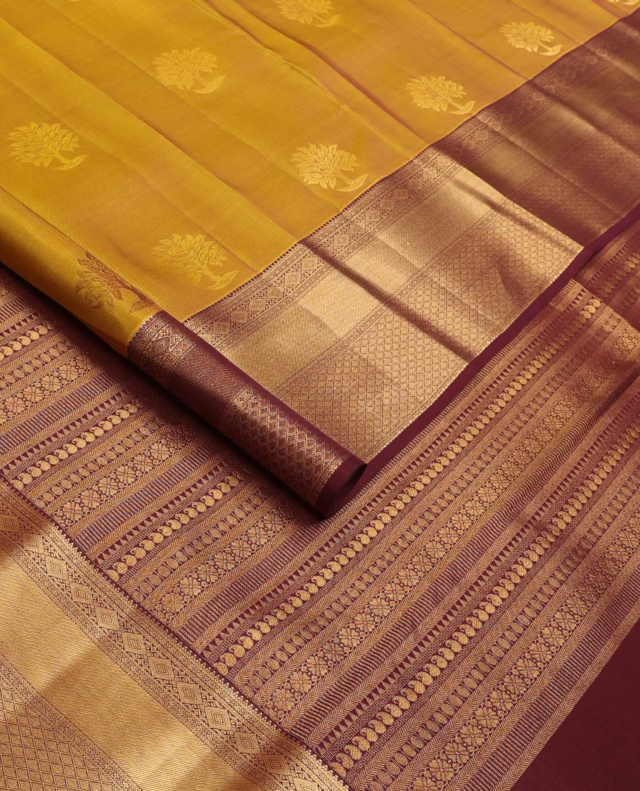 Green zari buttas Vasundhara silk mix saree, contrast border, and pallu steeped with traditional zari designs