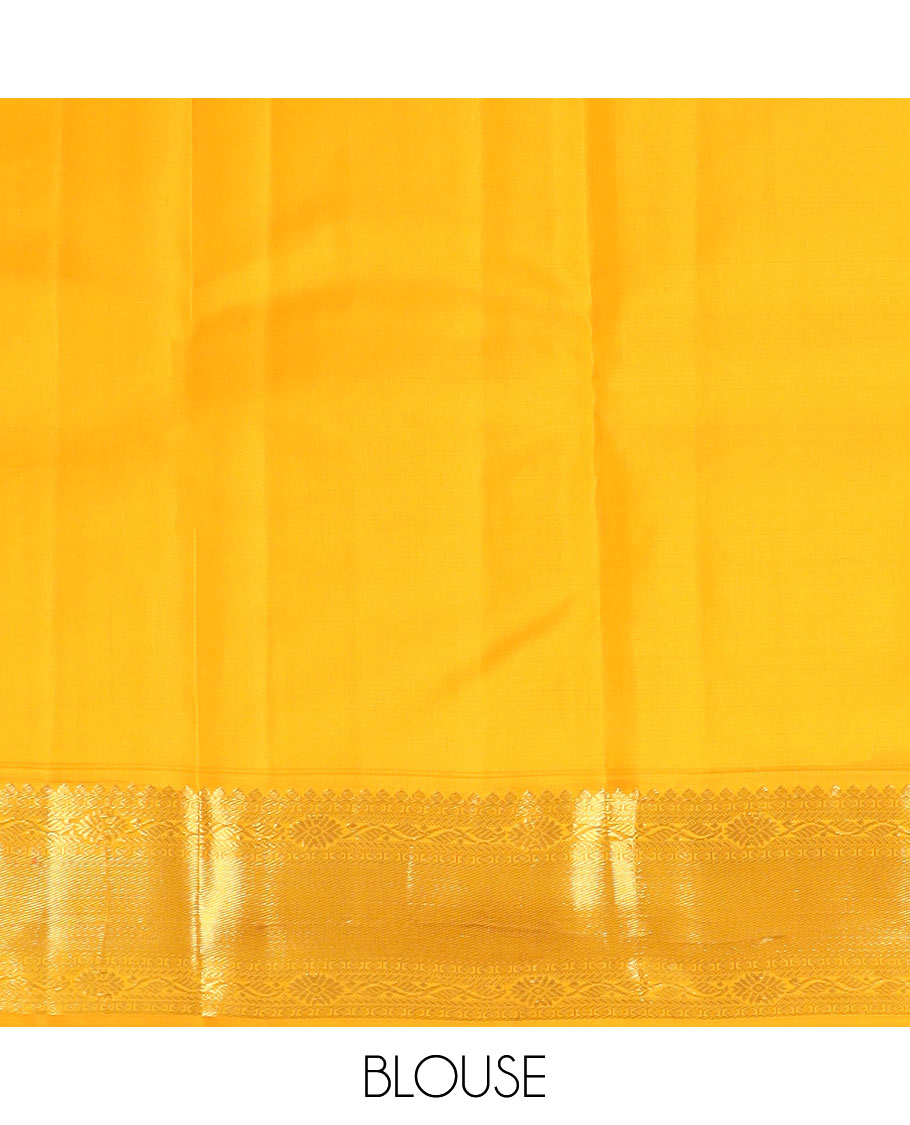 Blue zari buttas silk saree, contrast border of thilakam mokku, manga and floral designs, and jaal pallu