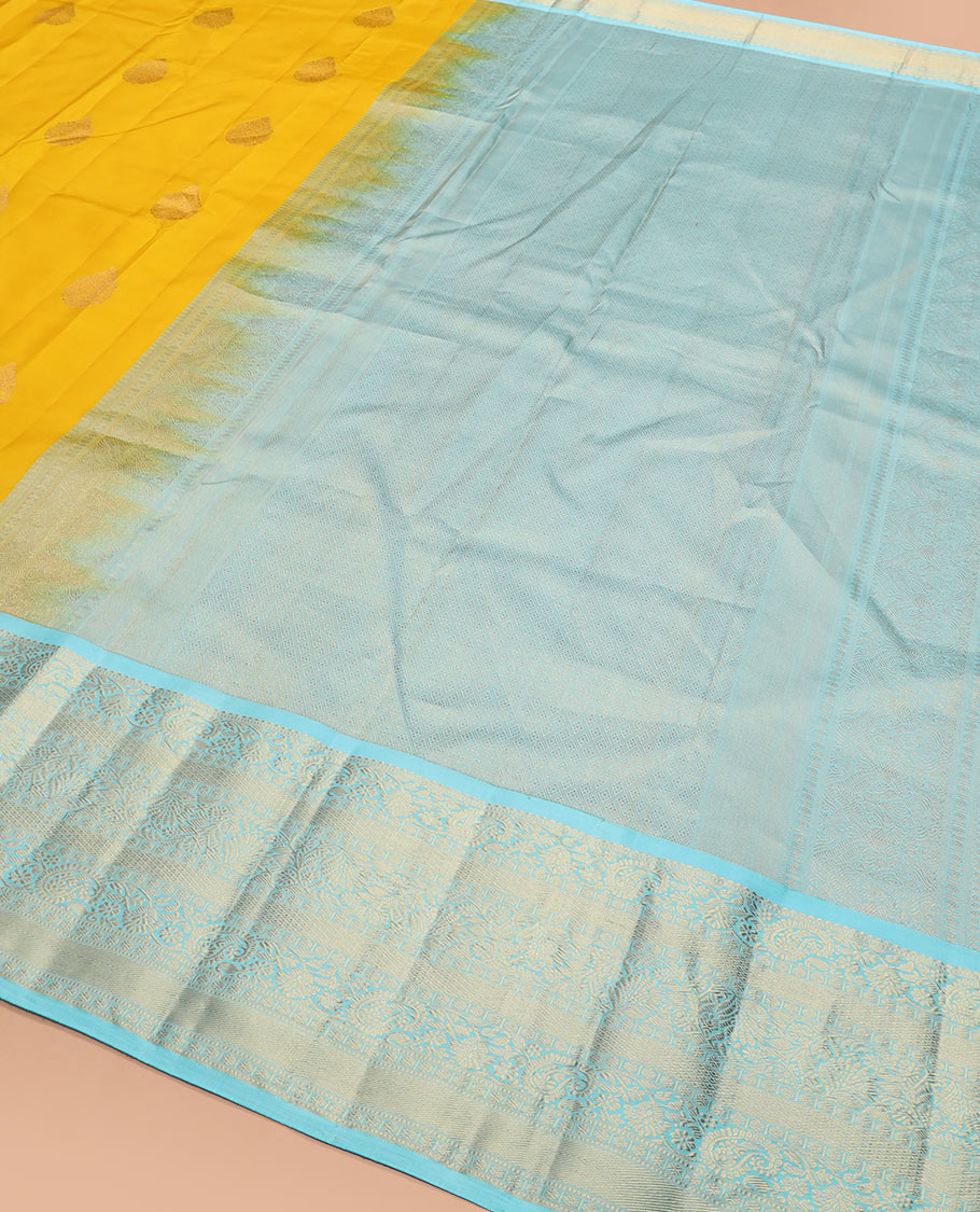 Yellow zari buttas silk saree, contrast border of rekku, muthu, kodi manga, kodi visiry, mayil kann, and rudraksham designs, and jaal pallu