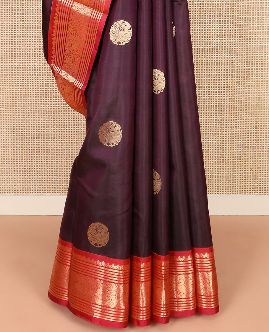 Purple Vasundhara Silk Saree Enthralled with Round Mayil Buttas, Highlighted with a Contrast Border of Thilakam Mokku, Kathir, Banaras, and Mayil Designs, Pallu Decorated with Jaal Design, and Paired with a Contrast Blouse