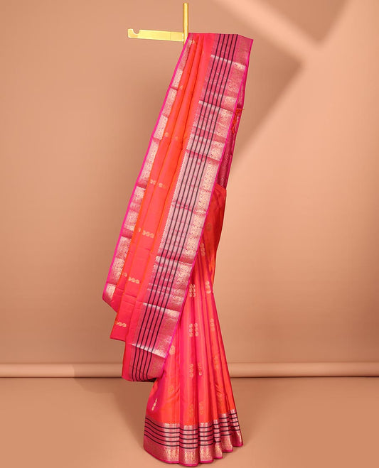 Orange mayil buttas silk saree, contrast intricate pallu & border steeped with neli & mayil designs