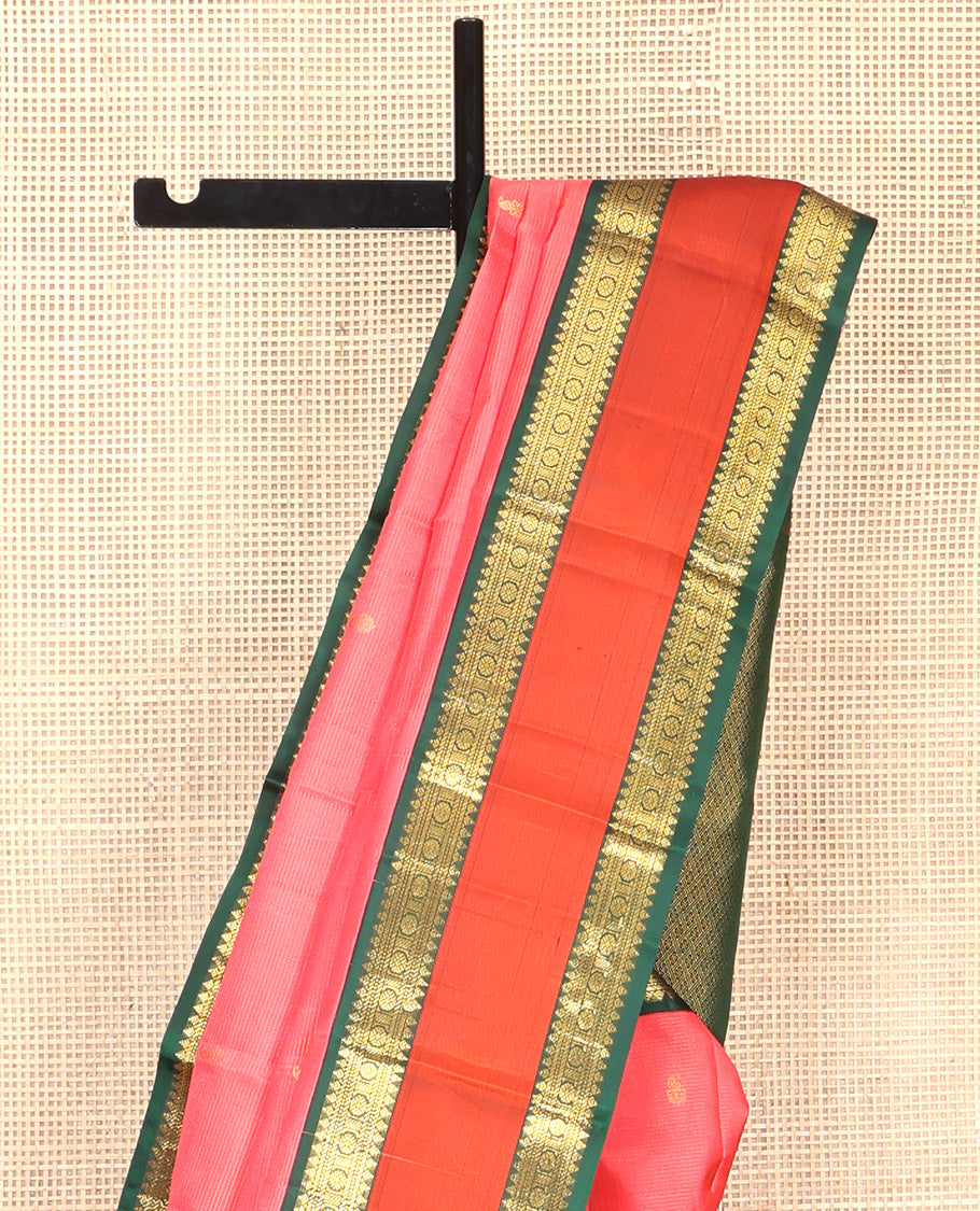 Pink Vasundhara Silk Saree, Subtly Woven with Stripes and Buttas All Over Its Body Complemented by Contrast Rettai Pettu Border of Thilakam, Banaras, Muthu, and Laddu Kamalam Designs, Grand Jaal Pallu and Paired with a Contrast Blouse
