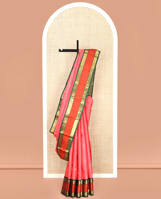 Pink Vasundhara Silk Saree, Subtly Woven with Stripes and Buttas All Over Its Body Complemented by Contrast Rettai Pettu Border of Thilakam, Banaras, Muthu, and Laddu Kamalam Designs, Grand Jaal Pallu and Paired with a Contrast Blouse