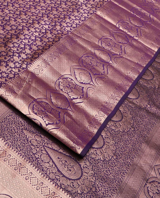 Purple jacquard wedding silk saree, zari border of thilakam mokku, muthu, diamond, jaal, and floral designs, and intricate pallu