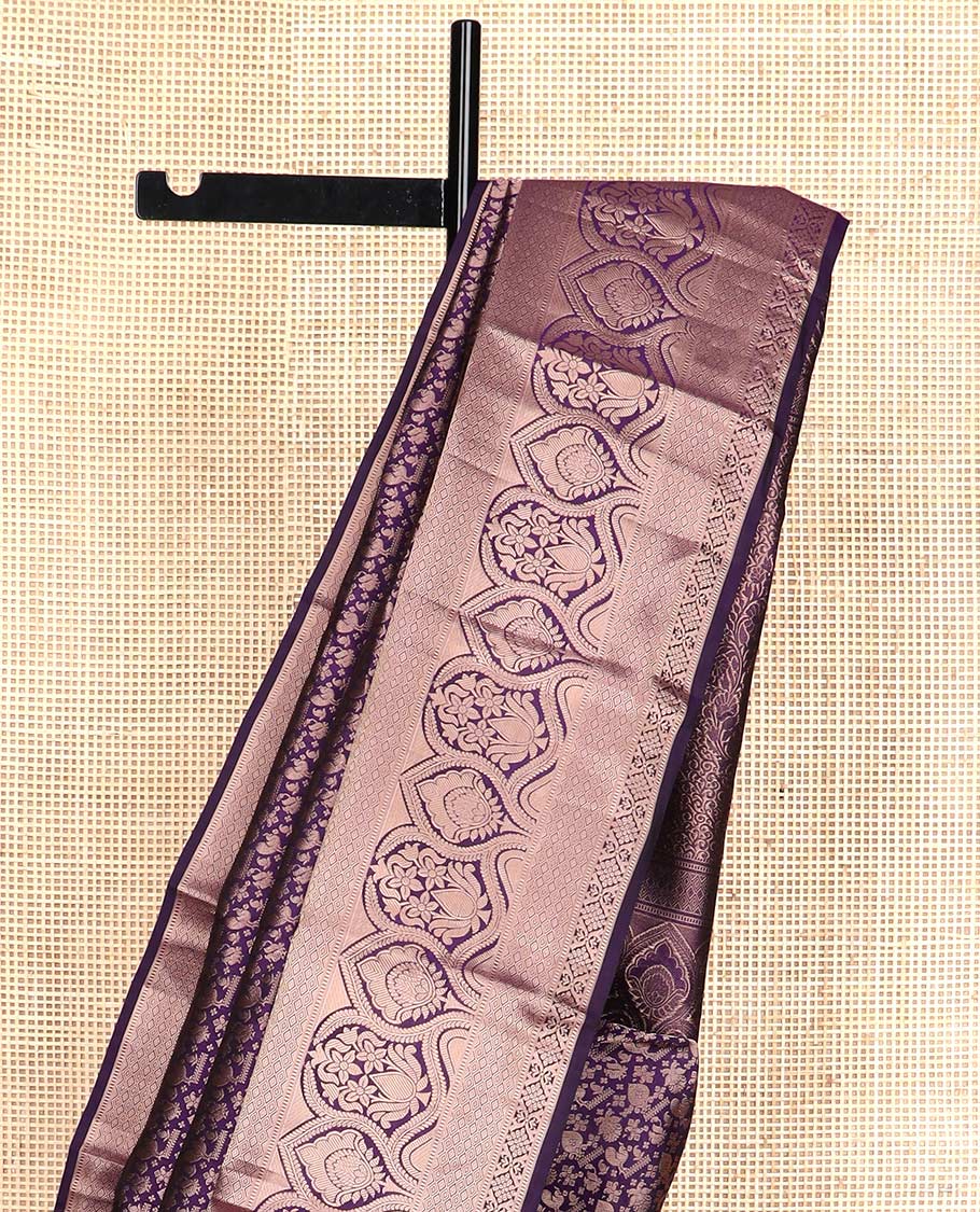 Purple jacquard wedding silk saree, zari border of thilakam mokku, muthu, diamond, jaal, and floral designs, and intricate pallu
