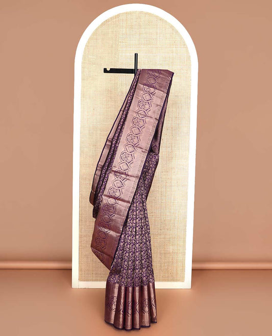 Purple jacquard wedding silk saree, zari border of thilakam mokku, muthu, diamond, jaal, and floral designs, and intricate pallu