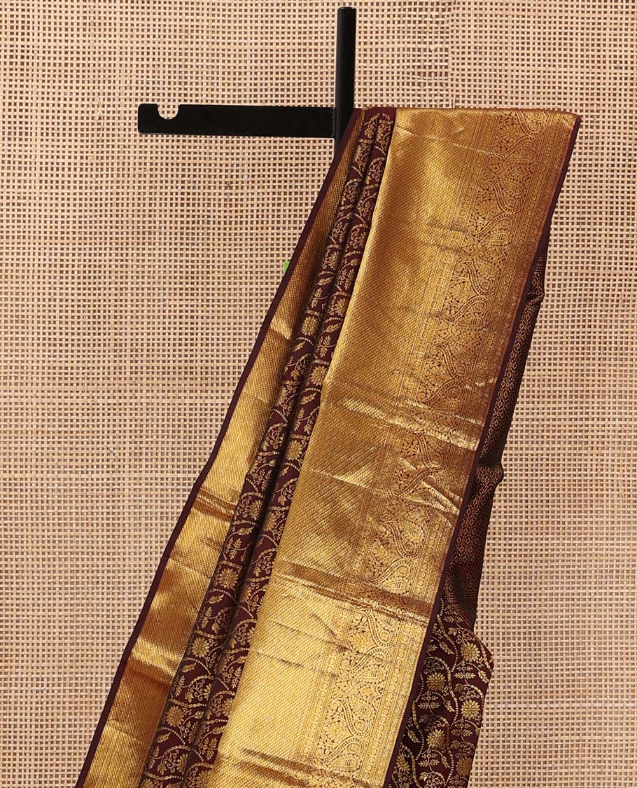 Brown jacquard wedding silk saree, traditional zari design steeped border, and zari-rich intricate pallu