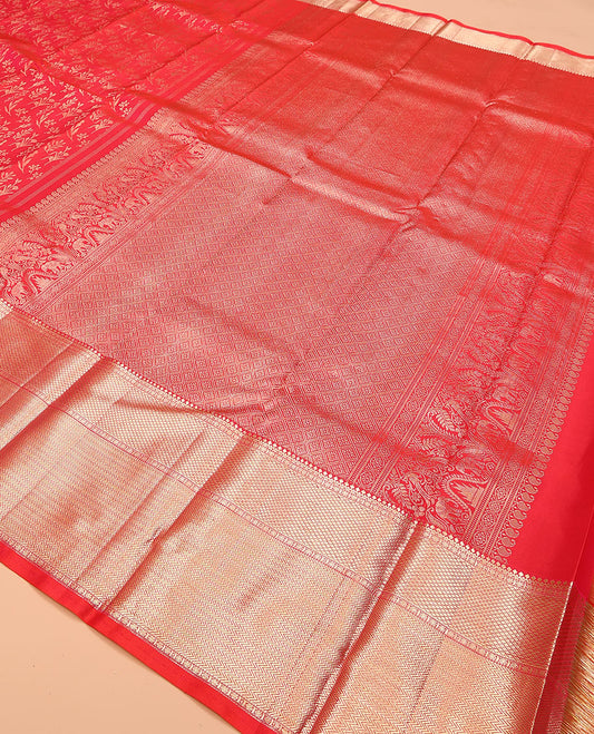 Red jacquard kanchipuram silk saree, zari border of thilakam mokku, mayil kann, and vanki designs, and jaal pallu