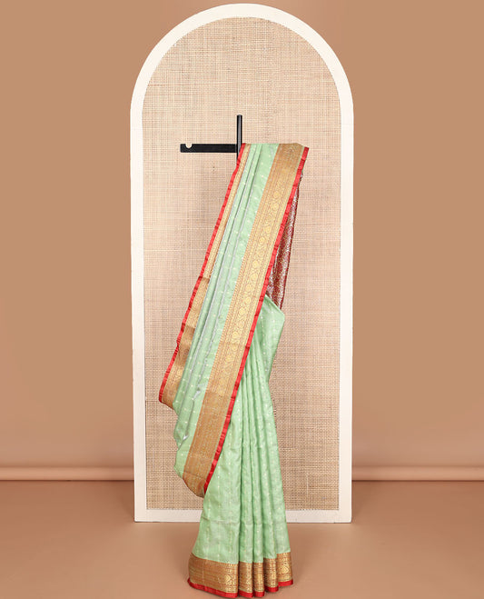 Sea green buttas semi banaras nylon with contrast zari designborder & floral jacquard pallu
