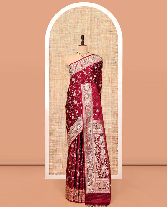 Red Wine Banarasi Satin Saree, Gleamed Up with Floral Jaal Jacquard, a Floral Creeper Border, Intricate Stonework Pallu, and a Matching Blouse