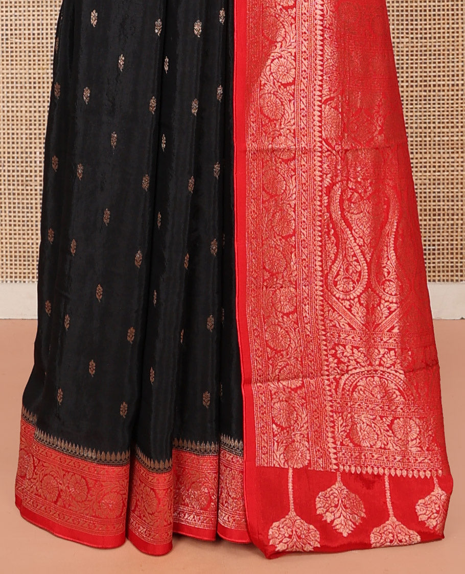 Black Fancy Crepe Saree, Spotlighted with Buttas, Complemented by a Contrast Floral Creeper Border, Intricately Designed Pallu, and a Contrast Blouse