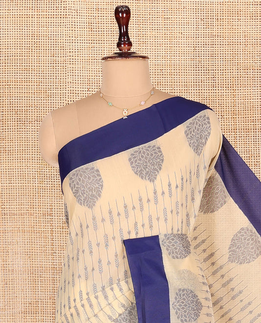 Cream Semi-Silk Cotton Saree, Bedecked with Unique Designs All Over Its Body, Complemented by a Contrast Border, Pallu of Intricate Designs, and Paired with a Matching Blouse