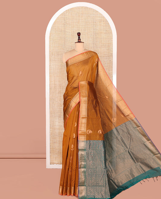 Mustard Semi-Silk Cotton Saree, Gracefully Embellished with Drop-Shaped Zari Buttas on Its Body, Complemented by Contrast Traditional Zari Border, Grand Pallu of Jaal Designs, and Paired with a Contrast Blouse