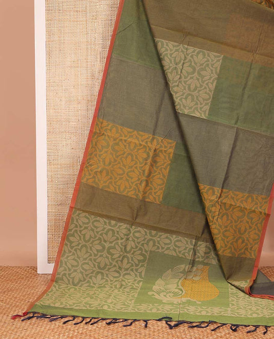 Borderless green jaal patterned gird buttas Coimbatore cotton saree, self-pallu of jaal and leaf motifs