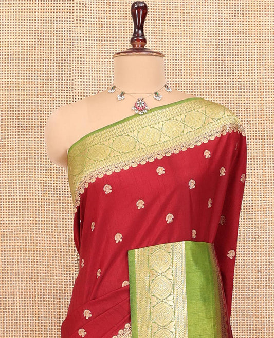 Maroon Dupion Silk Saree, Accentuated with Buttas All Over Its Body, Complemented by Contrast Traditional Border of Paisleys and Chakram Designs, Intricately Designed Pallu, and Paired with a Contrast Blouse