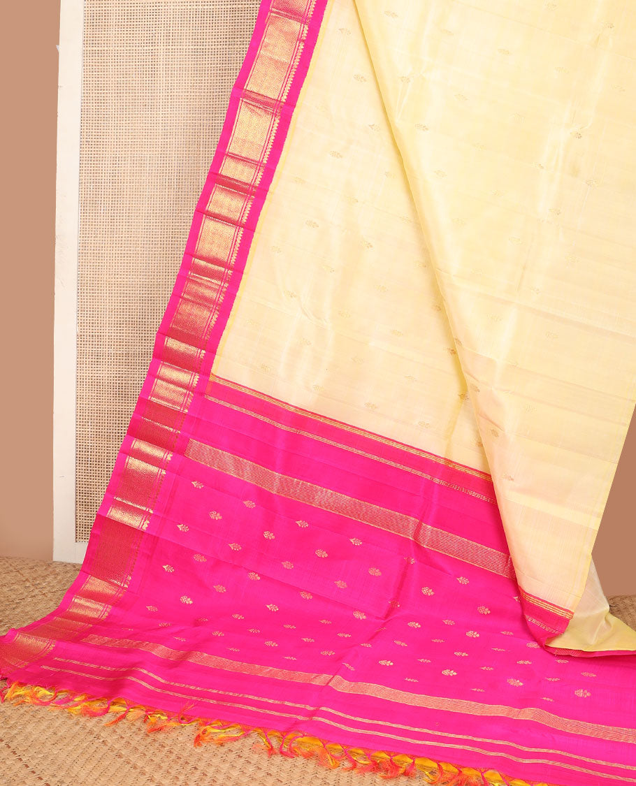 Yellow zari buttas kanchipuram silksaree, contrast one-sided korvai border of thilakam mokku & jaal & pallu of stripes & zari buttas
