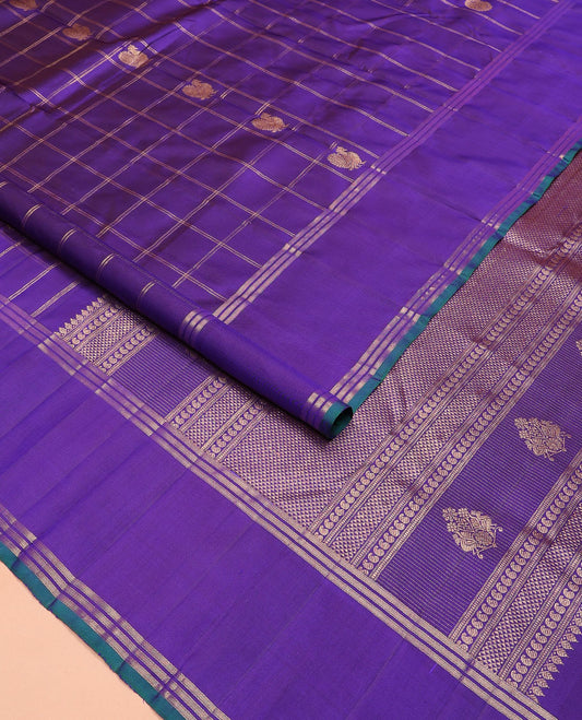 Violet manga-mayil butta enclosed checked Kanchipuram silk saree, bodi border of stripes, and pallu of thilakam mokku, muthu, manga, and ara madam designs