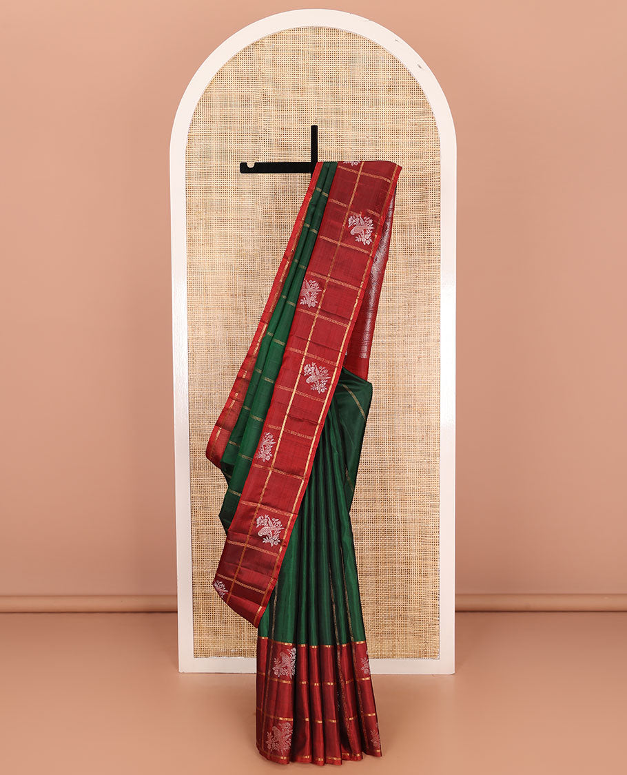 Green zari design Kanchipuram silk saree, contrast zari buttas enclosed checked border, and pallu of manga, rudraksham, and kathir designs