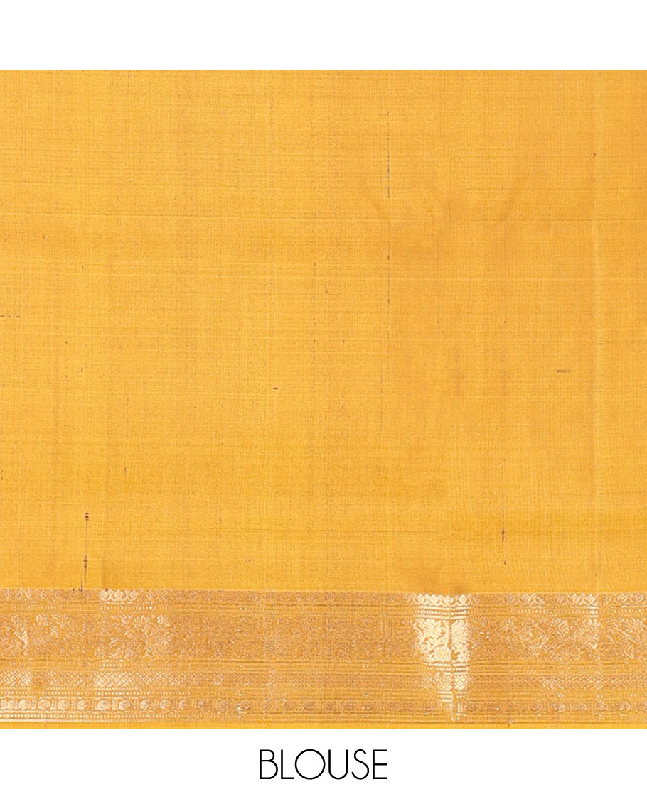 Green zari buttas soft silk saree, contrast border of salngai, muthu, banaras, kodi visiry, rudraksham, and mayil kann, and floral vine pallu