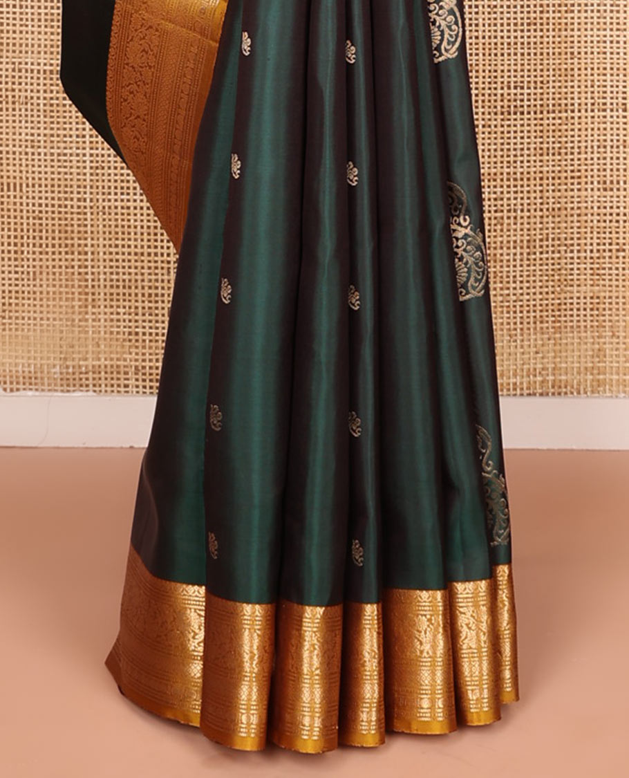 Green zari buttas soft silk saree, contrast border of salngai, muthu, banaras, kodi visiry, rudraksham, and mayil kann, and floral vine pallu